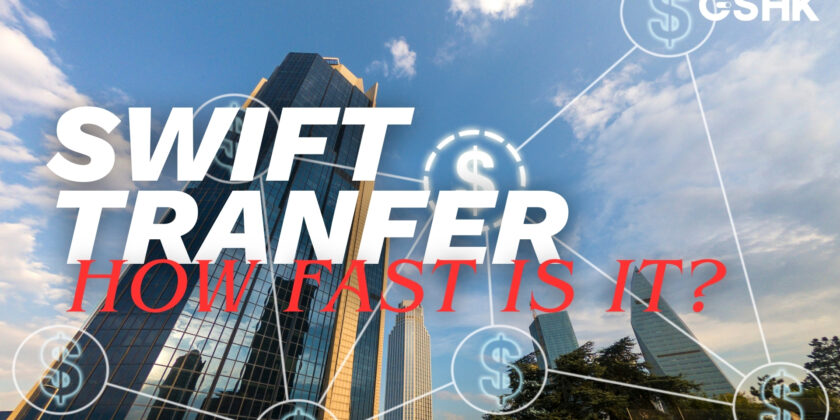 Cover Image For An Article About SWIFT Transfer Speed, Featuring A Dramatic Low-angle View Of Modern Skyscrapers With Networked Dollar Sign Icons Overlaid.