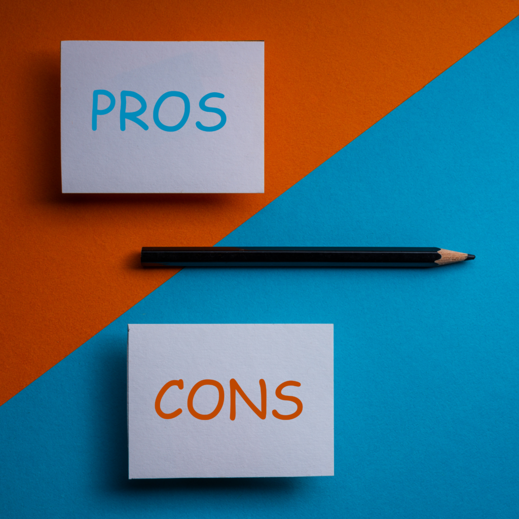 A vertical image with a bold, two-toned background, diagonally split between orange (top left) and blue (bottom right). A black pencil lies horizontally across the center line, dividing two white cards. The top card, on the orange background, has the word "PROS" written in blue capital letters. The bottom card, on the blue background, has the word "CONS" written in orange capital letters. The image visually represents the Pros and Cons of segregated accounts.